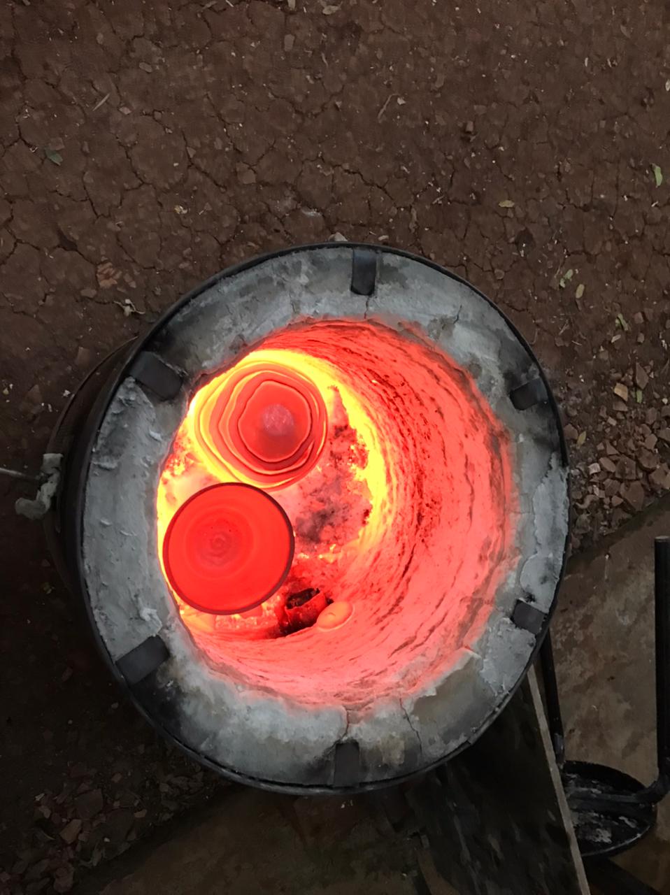 Raku kiln firing with Waithira Chege